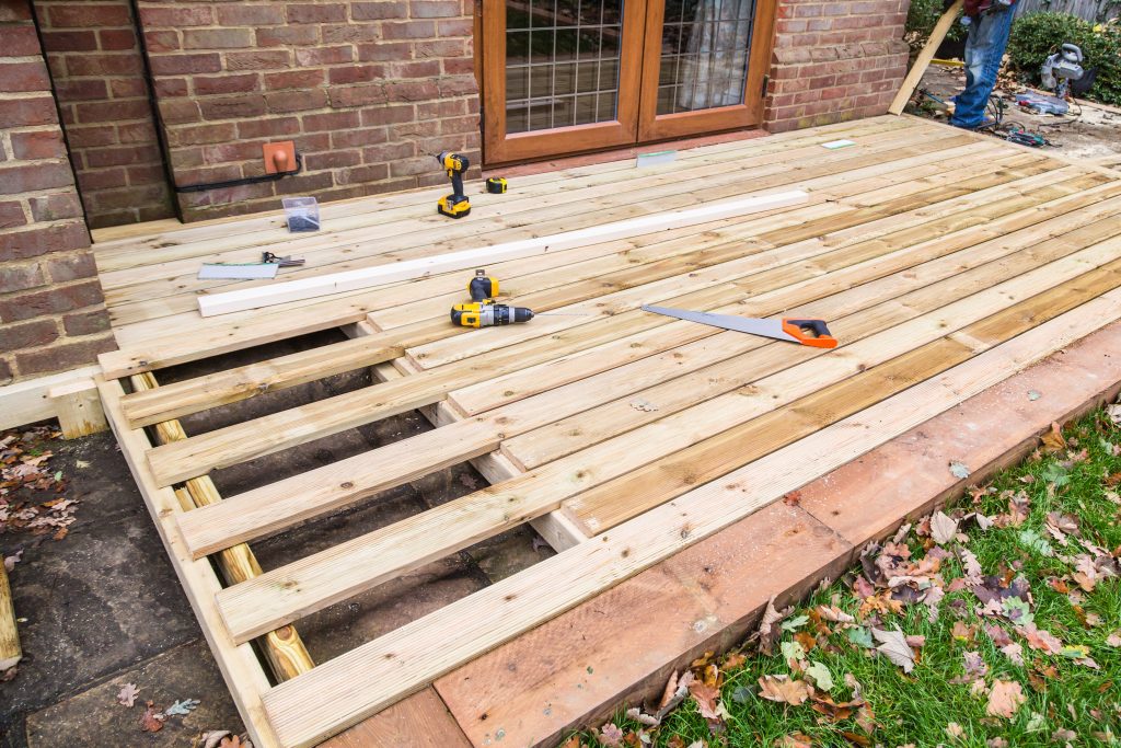 cover image - What are some strategies to boost my home's market value by building a deck? - faq - Bright Habitats