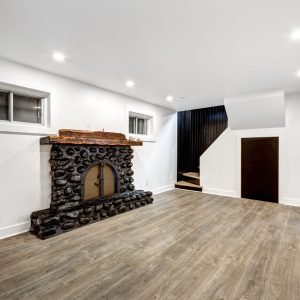 How can one ensure proper waterproofing during a basement renovation?