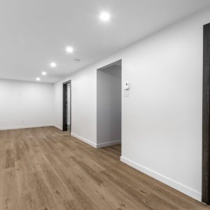 How can the HVAC system be integrated into a basement renovation?