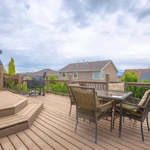 What materials are used for constructing rooftop patios?